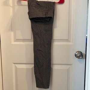 Patterned skinny leg dress pant.